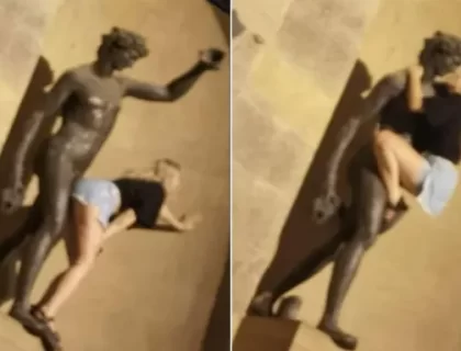 Tourist filmed kissing the statue of Bacchus, the god of wine and sensuality in Italy