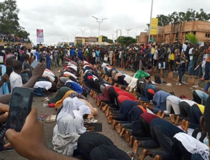 Christian Protesters Protect Their Muslim Counterparts As They Observe Their Prayers In Jos