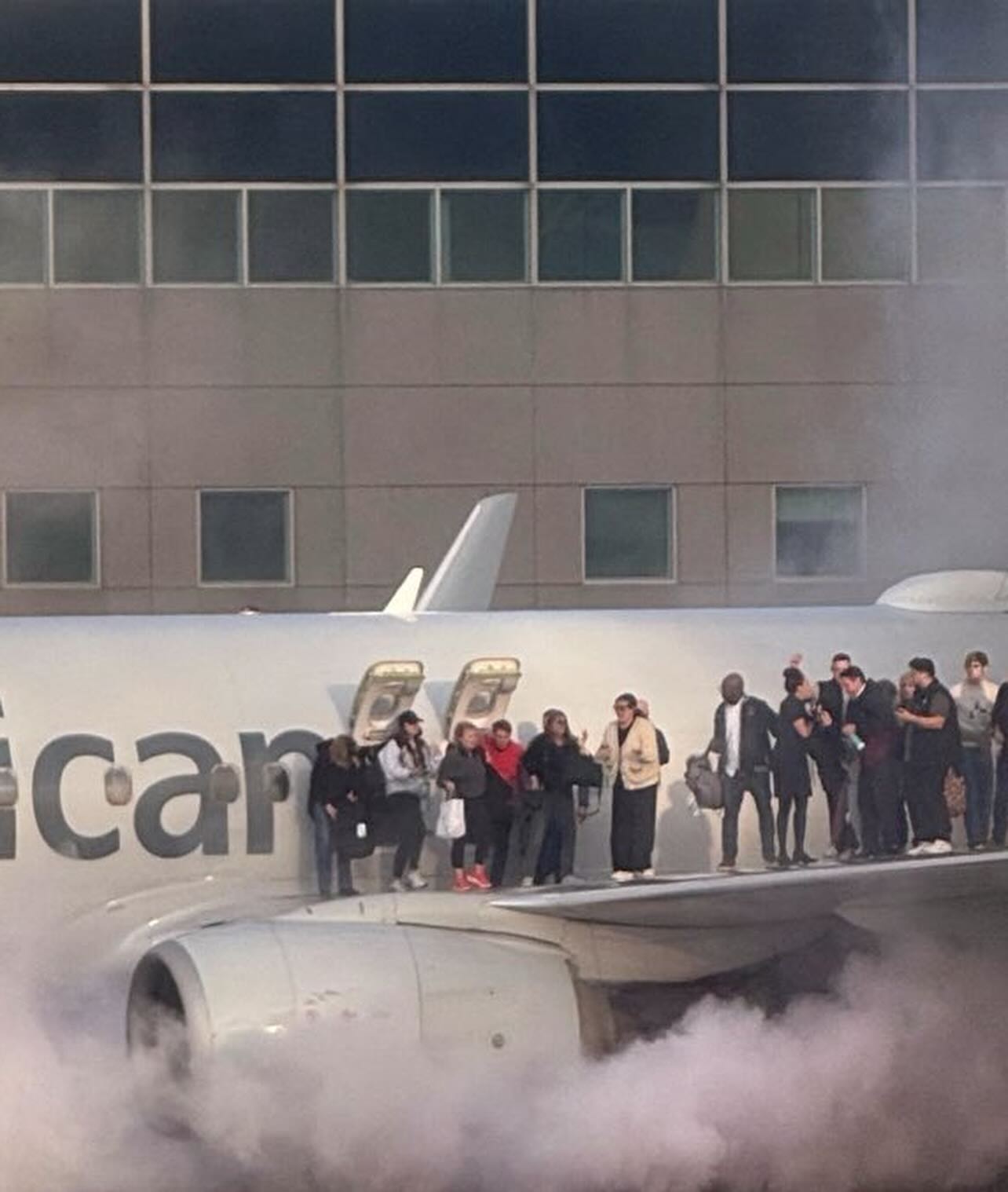 American Airlines Plane Catches Fire at Denver Airport, 12 Hospitalized with Minor Injuries (Video)