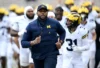 Ex-Michigan Coach Sherrone Moore Detained Amid Assault Probe After Sudden Firing